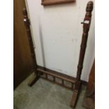 An early 20th century oak cheval mirror stand