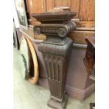 A Victorian carved oak pedestal