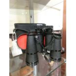 A cased set of 20x50 binoculars