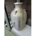 A modern reproduction Grecian style urn