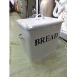 A white enamel bread bin