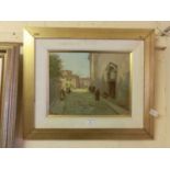 A framed oil on board of continental street scene signed bottom left