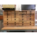 A mid-20th century oak specimen/tool cabinet