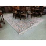 A Chinese blue ground floral rug