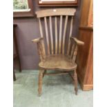 A 19th century beech and elm lathe back arm chair (A/F)