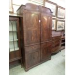 An 18th century mahogany linen press (A/F)Heavy restoration needed. Bottom doors sealed shut. Knocks