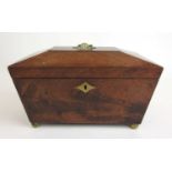 A Regency mahogany sarcophagus shaped tea caddy, the interior with three compartments, w. 25 cm,