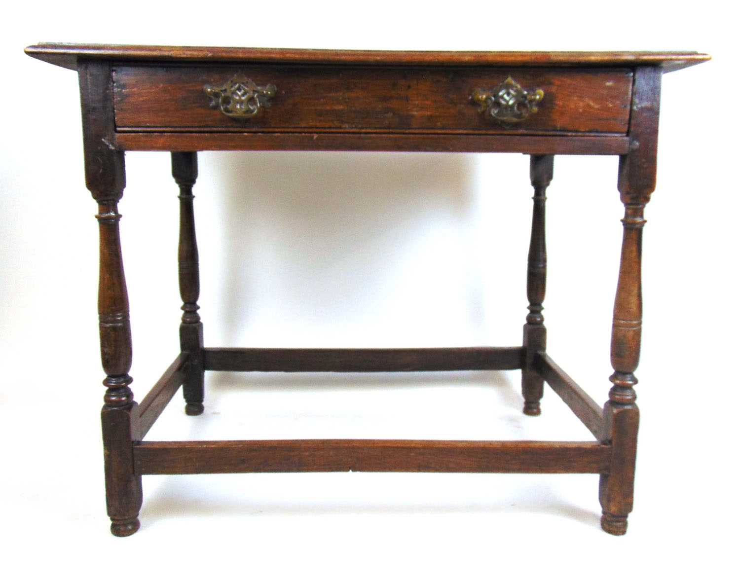 An 18th century and later oak single drawer side table on turned legs, h. 69 cm, w. 88 cm, d. 54