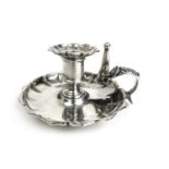 A William IV silver chamberstick of small proportions. Hallmarked for Birmingham 1832, makers mark