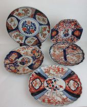 A collection of five late 19th/early 20th century Japanese imari pattern chargers, max dia. 36.5 cm