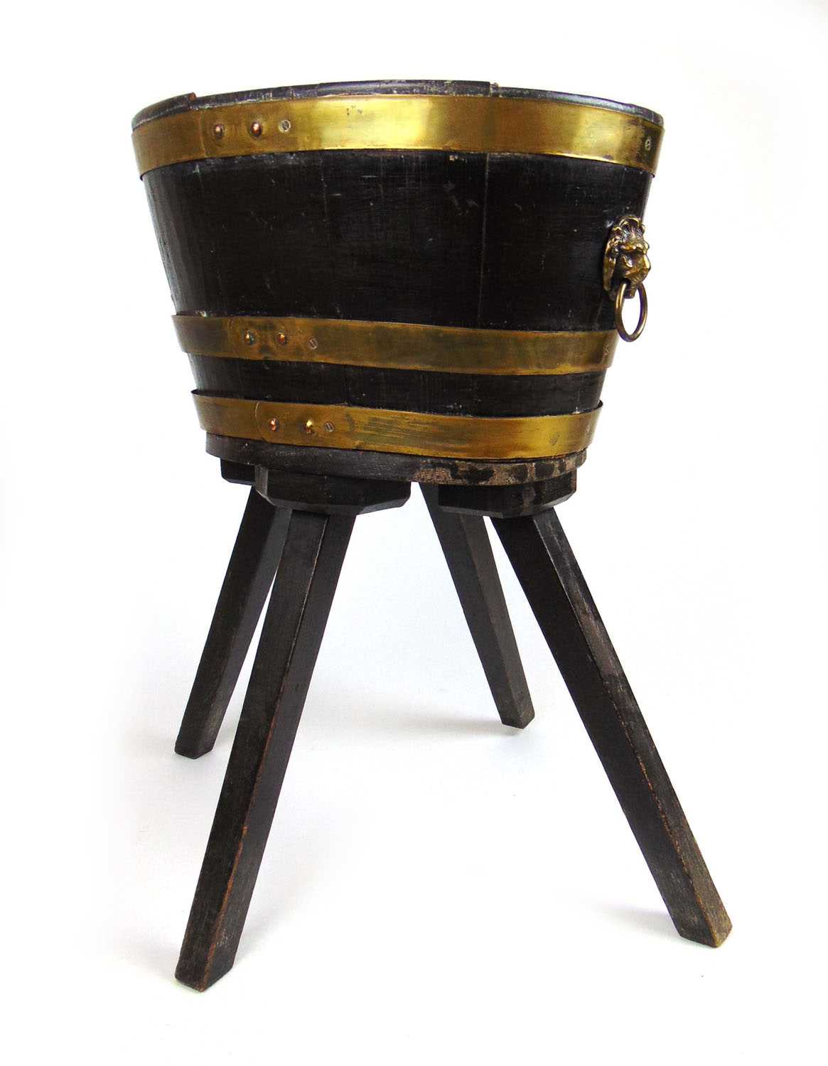 An 18th century oak and brass banded wine cooler on later base, the oval body with brass lion mask - Bild 2 aus 2