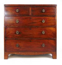 A late 18th century mahogany chest of two short over three long drawers, the caddy top over the