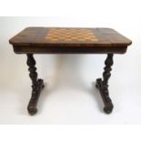 A Victorian rosewood and inlaid games table, the top with satinwood and mahogany chess board sliding