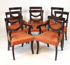 A set of eight (6+2) Regency mahogany dining chairs, the reeded top rail above the reeded swag