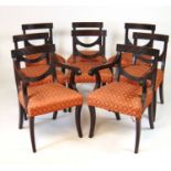 A set of eight (6+2) Regency mahogany dining chairs, the reeded top rail above the reeded swag