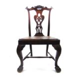 An early 19th century Anglo-Indian rosewood dining chair, the carved cresting rail over a pierced