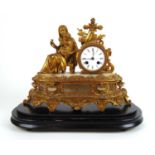 A late 19th century white marble and gilt metal mantle clock, the enameled face with Roman