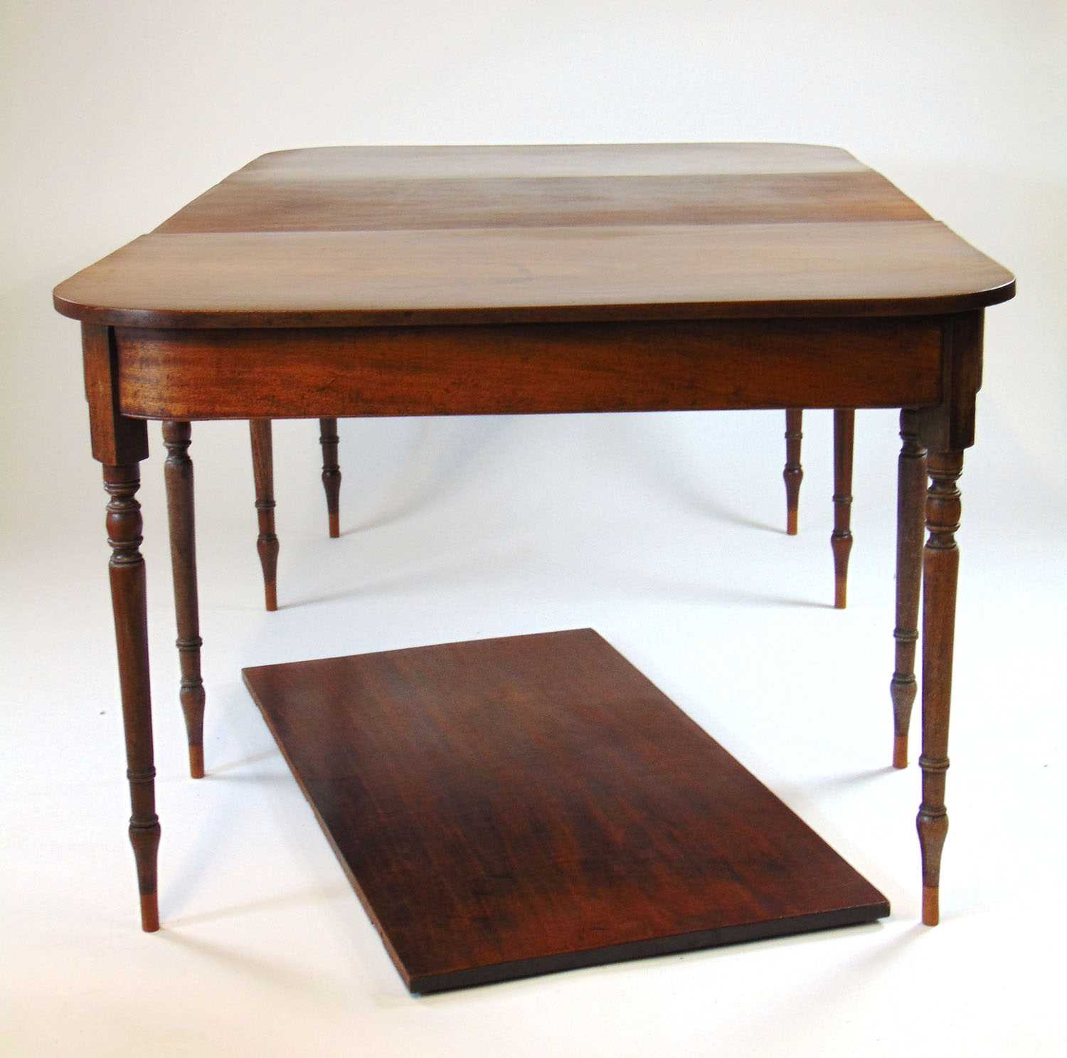 An early 19th century and later mahogany extending dining table, the two D-ends on turned legs - Image 3 of 16