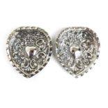 A pair of late Victorian silver heart shaped pin trays. Hallmarked for Birmingham 1899, makers