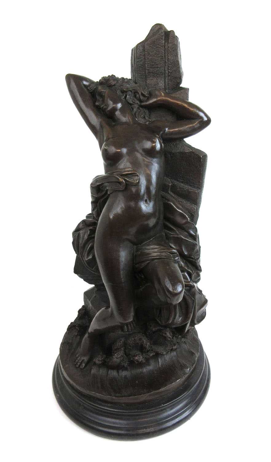 A large contemporary bronze model of a nude on a rock. Unsigned, h. 49 cm