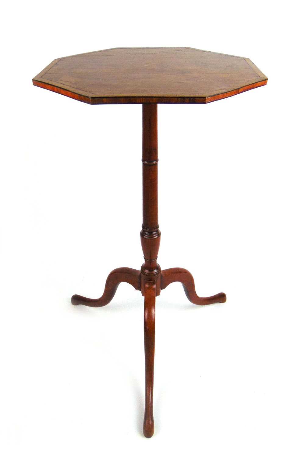 An 18th century satinwood wine table, the octagonal banded top over a turned column and three scroll