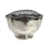 An Edwardian silver rose bowl with cover. Hallmarked for London 1902, makers mark for Thomas