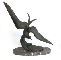 Irene Rochard (1906-1984), a bronzed metal model of seabird on the crest of a wave, mounted on a