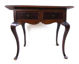 An early 18th century beech and fruitwood side table, the moulded top over two drawers on cabriole