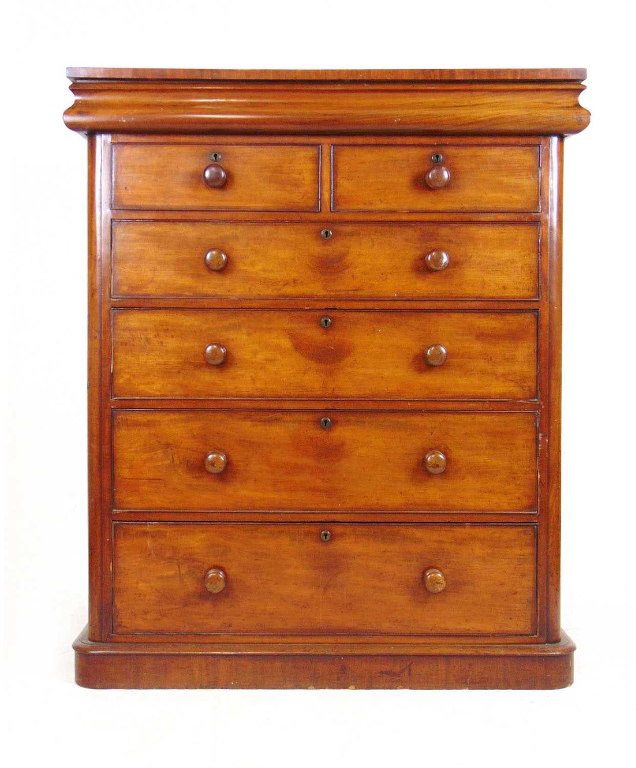 A 19th century mahogany chest of drawers, the top over single frieze drawer above two short and four