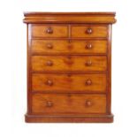 A 19th century mahogany chest of drawers, the top over single frieze drawer above two short and four