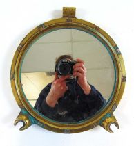 A brass porthole frame with later mirror insert, dia. 30 cm