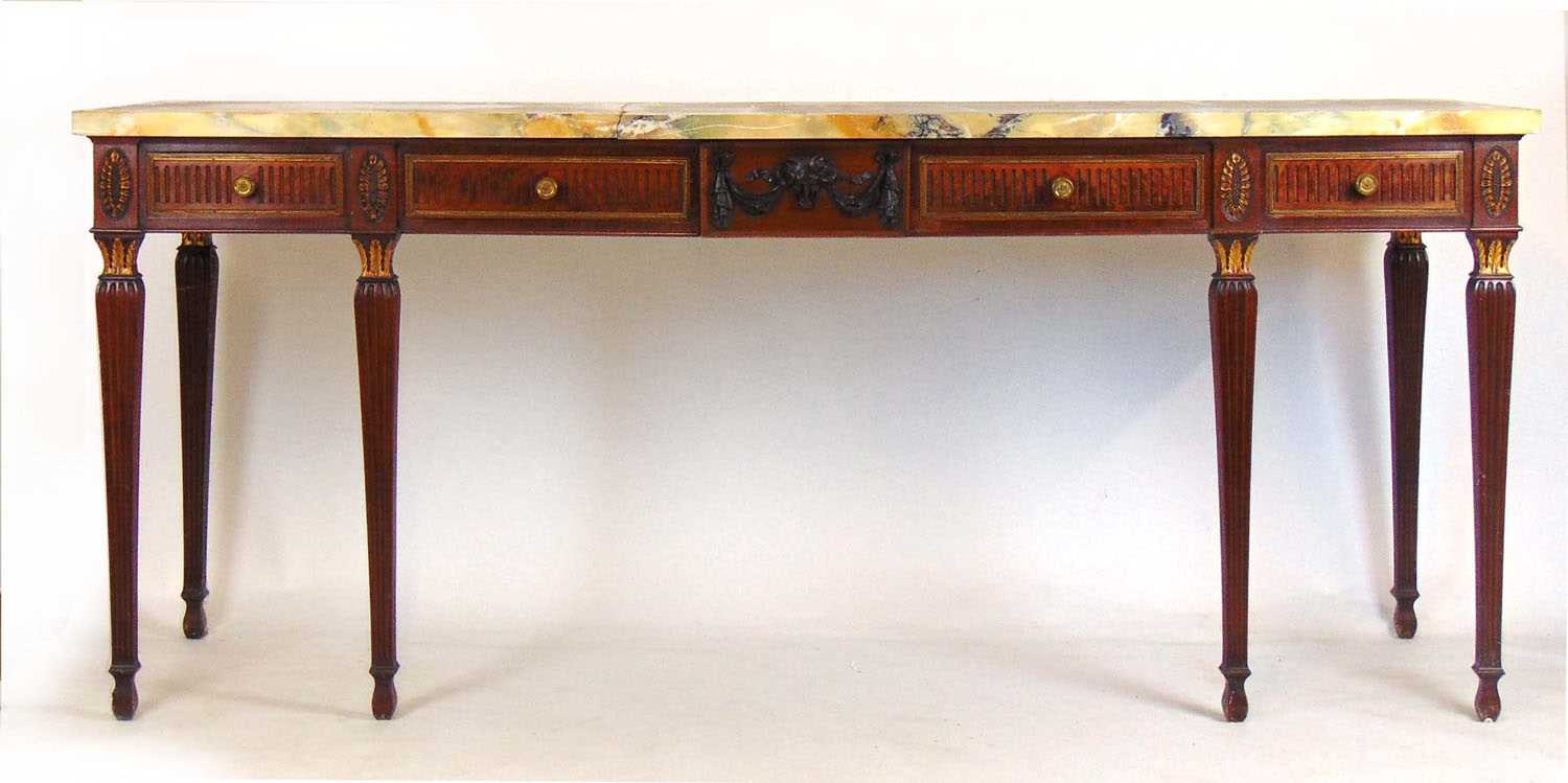 A late 18th century mahogany, parcel gilt, brass mounted, and marble topped sideboard, the yellow