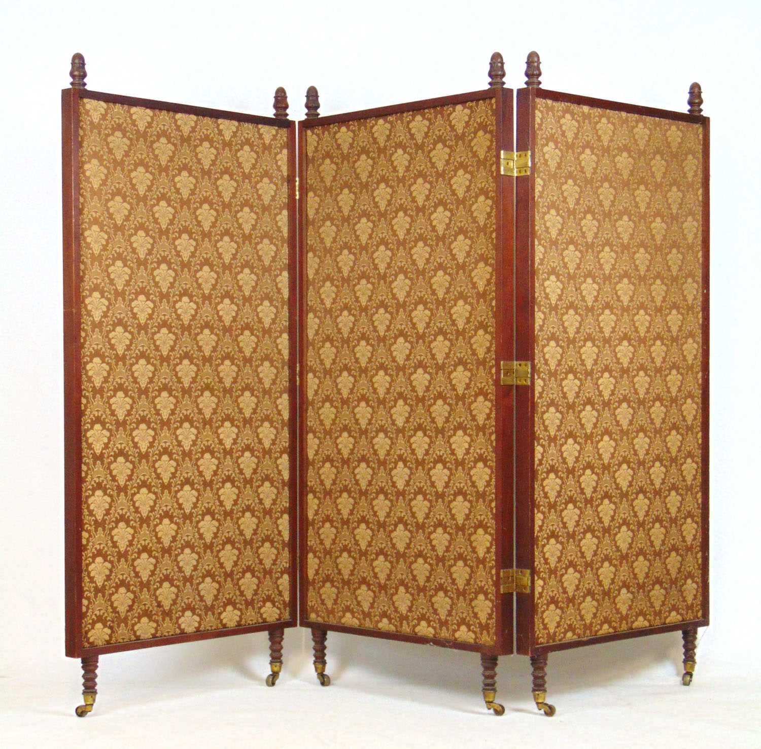 A 19th century walnut three fold screen, the finials over patterned fabric panels on turned feet and - Image 2 of 2
