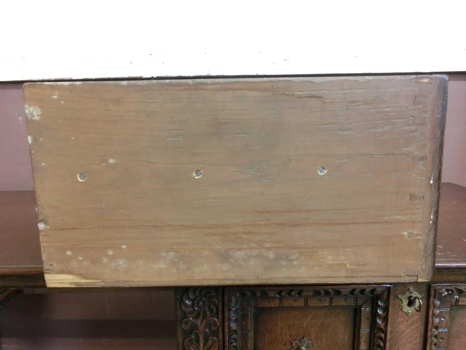 A 17th century style oak dresser base, the top over three panel front drawers over carved legs and - Image 5 of 12