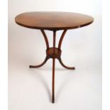 An 18th century satinwood and inlaid gueridon/occasional table, the circular top over three C-scroll