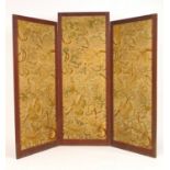A 19th century carved oak three fold screen with crewel work panels, h. 182 cm, max w.