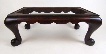 An 18th century red walnut stool base on cabriole legs, h. 25 cm, w. 69 cm, d. 44 cmNo seat. Castors