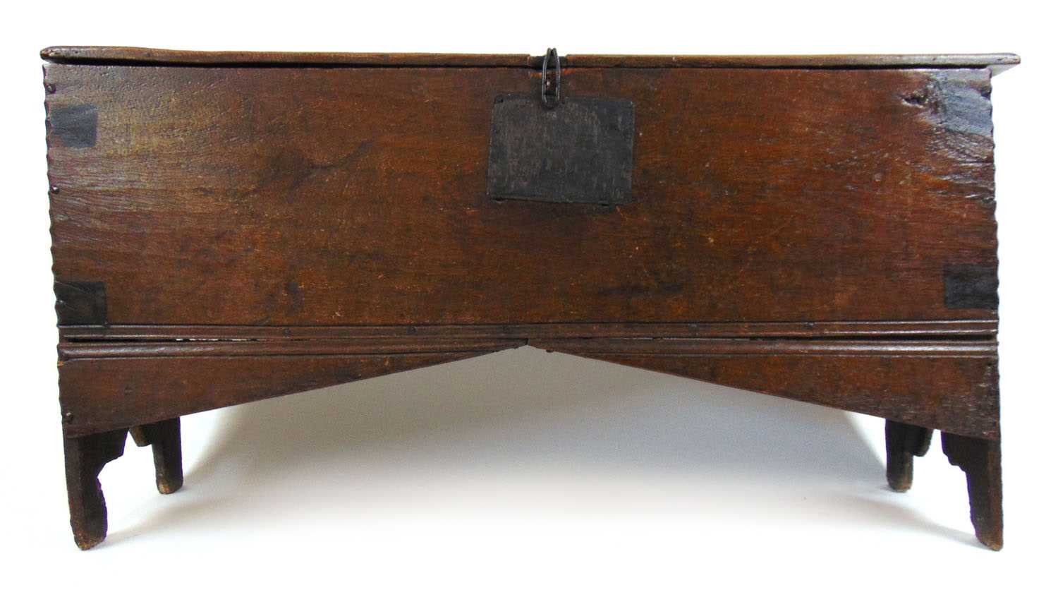 A late 17th century oak six plank coffer, the top lifting to reveal a vacant interior, h. 62 cm,