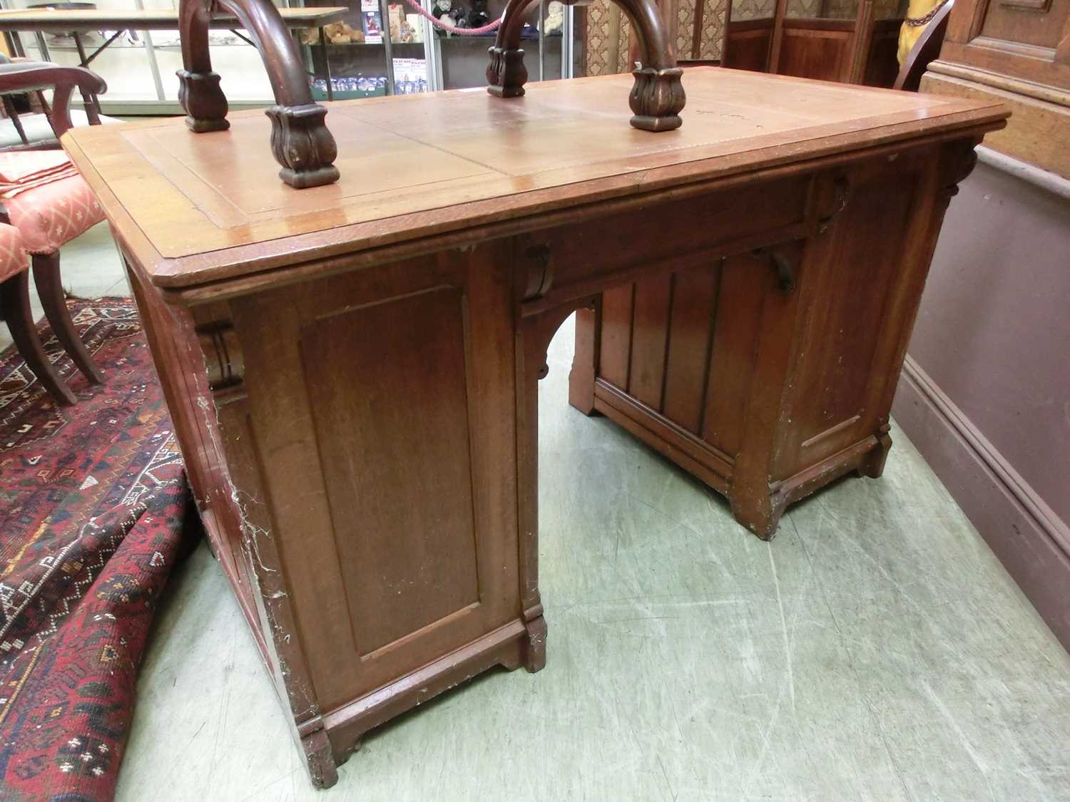 A late Victorian oak free standing twin pedestal desk, the top with a brown tooled leather insert - Image 3 of 3