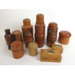 A collection of 19th/early 20th century treen bottle holders, glass holders (without glasses) and