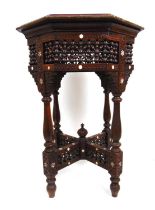 A late 19th century Moorish carved and mother of pearl inlaid occasional table. the octagonal top
