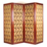 A late 19th century mahogany four fold screen with patterned fabric panels, h. 181 cm, max length