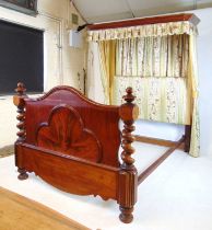 A 19th century and later mahogany half tester bed, the canopy upholstered in a floral striped fabric
