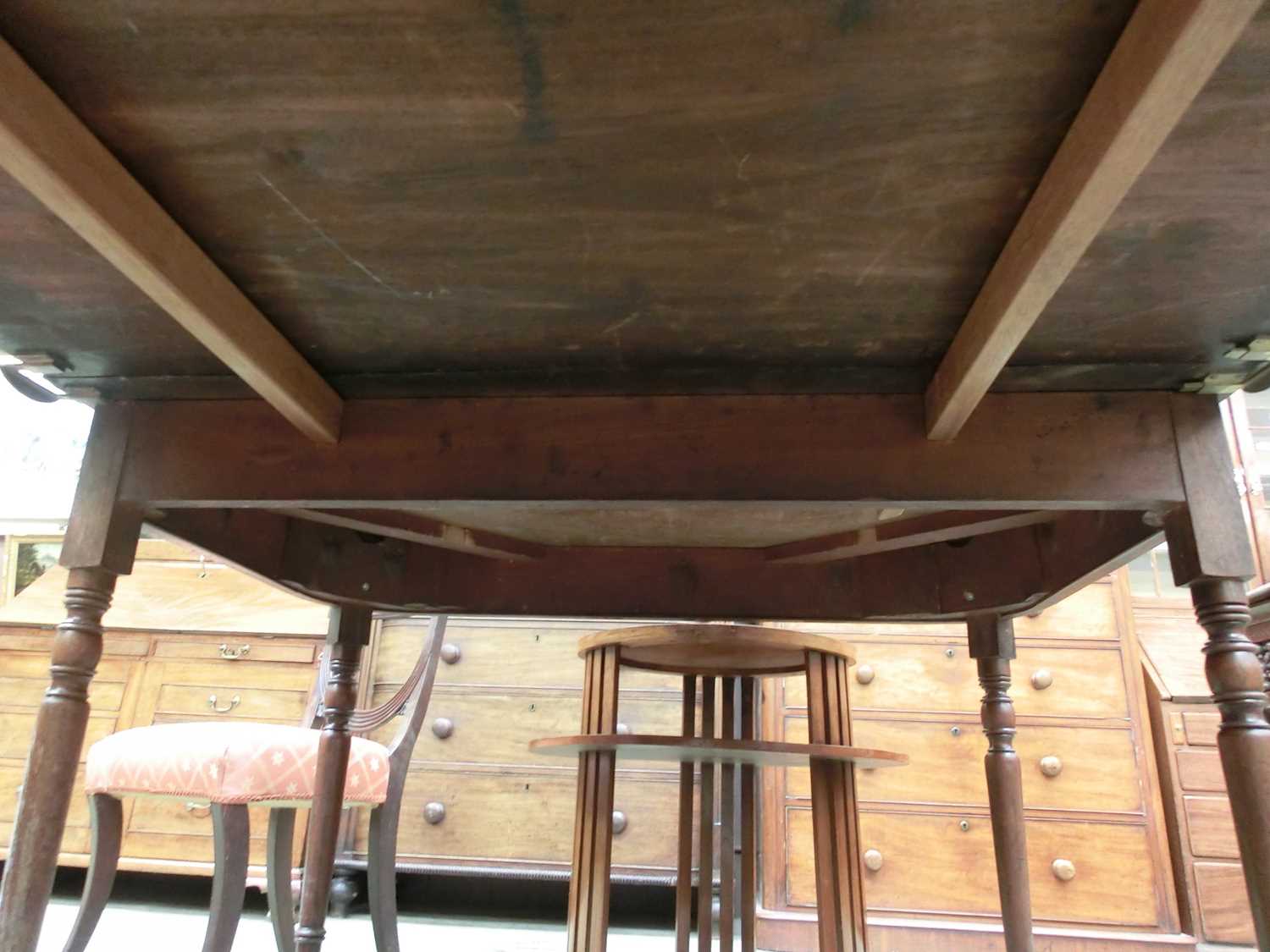 An early 19th century and later mahogany extending dining table, the two D-ends on turned legs - Image 10 of 16