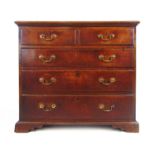 A mid 18th century oak chest of two short over three long drawers on bracket feet, h. 91 cm, w.