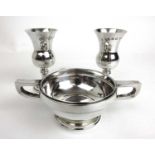 A George V silver twin handled cup or quaich together with two small Elizabeth II silver goblets.