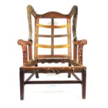 An 18th century mahogany and oak wing armchair frame, h. 120 cm, w. 80 cm, d. 80 cmNeeds