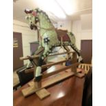 A modern dappled rocking horse on rocker baseDimensions:H: (Frame)53cm (Entire item) 117cmL: 137cmW: