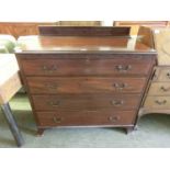 An early 20th century mahogany chest of four drawers