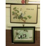 A framed and glazed Japanese needlework of cranes on branch along with a framed and glazed